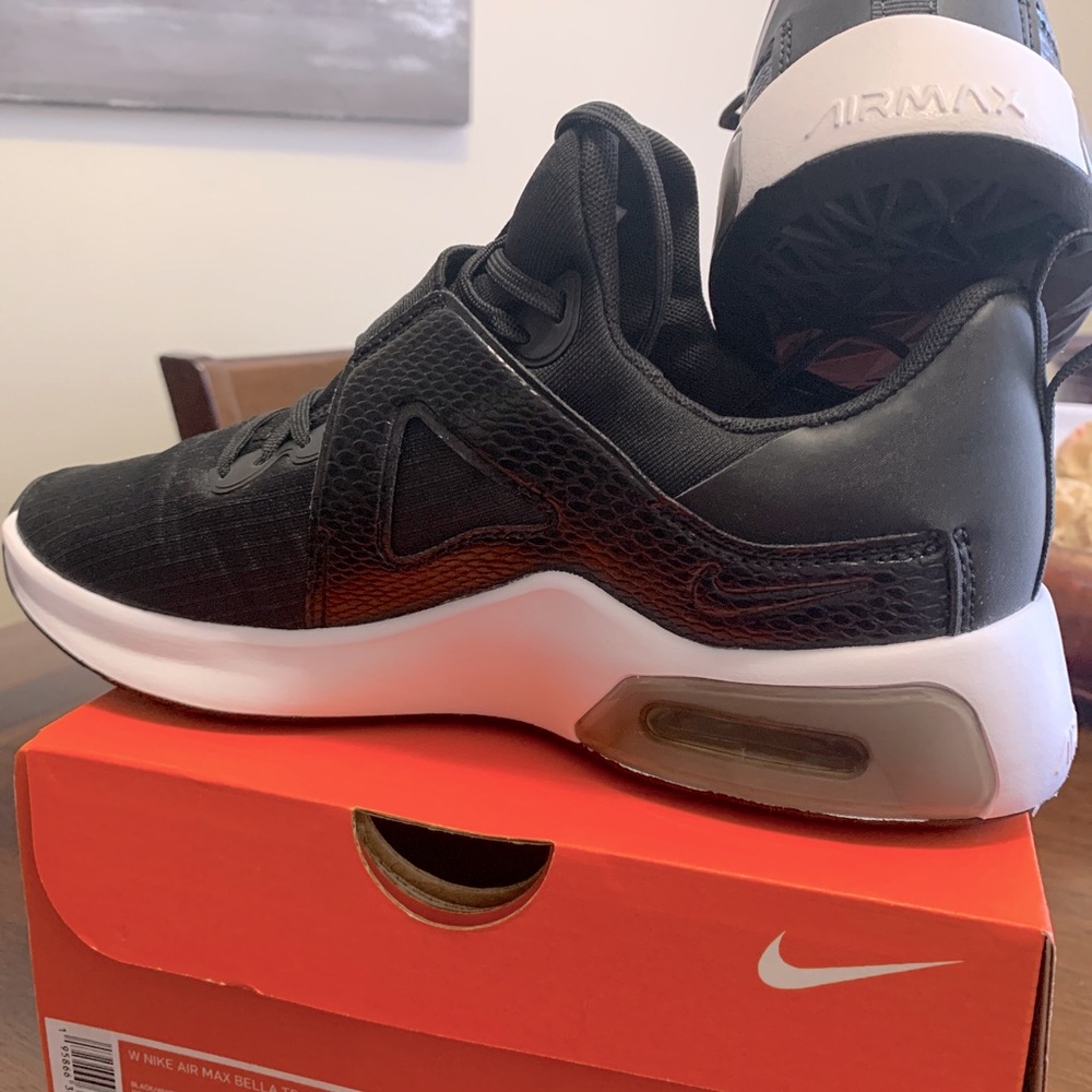 In OG box, never been worn.
